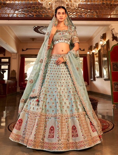 Mint blue satin silk lehenga choli with heavy embellishments