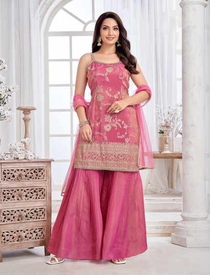 Pink silk sharara suit with festive shimmer detailing