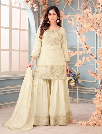 Cream silk sharara suit with elegant yoke embroidery