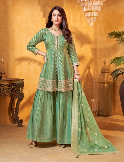 Pista green silk sharara suit with elegant zari work