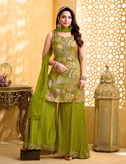 Mehendi green silk palazzo suit with festive detailing