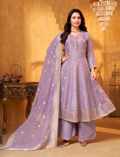 Lilac purple silk anarkali suit with rich embellishments