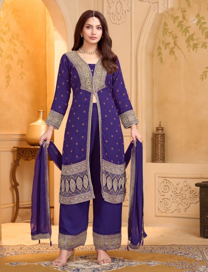 Purple silk pakistani festive suit with heavy embellishments
