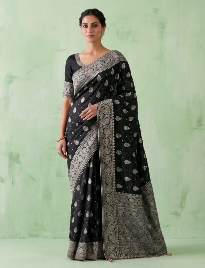 Black dola silk saree with rich zari butta work