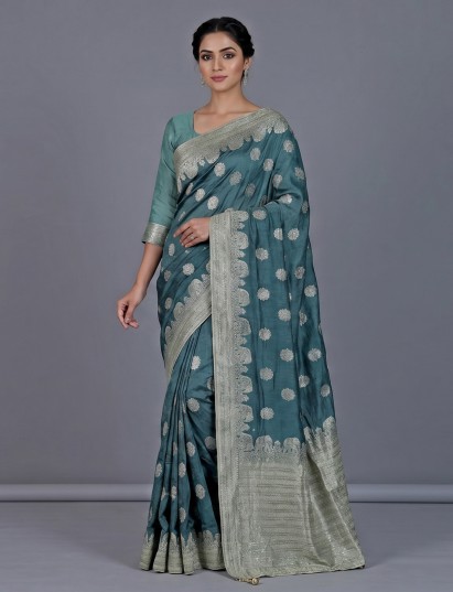 Rama green dola silk saree with regal elephant motifs