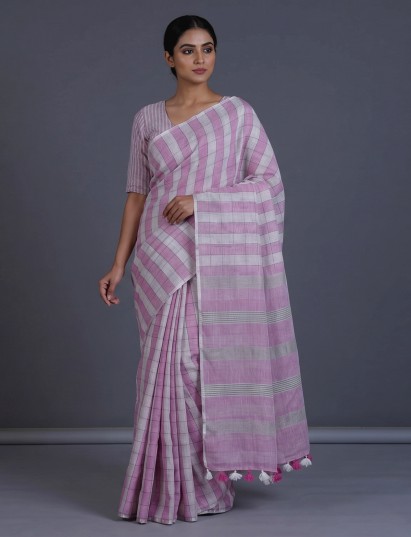 Light pink checked linen saree with tassel pallu charm