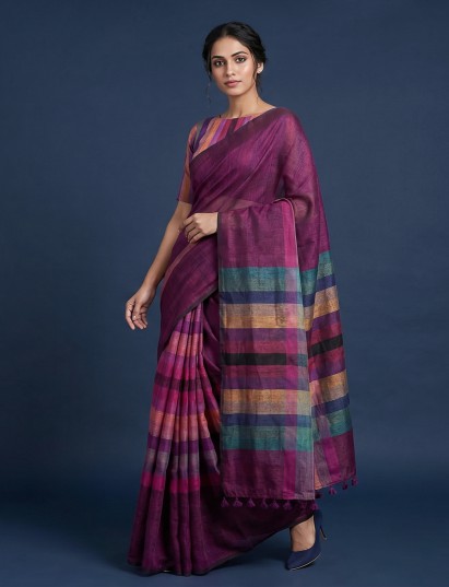 Purple striped linen saree with tassel pallu detail