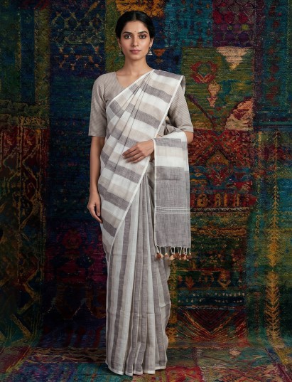 White grey printed linen saree with tassel pallu elegance