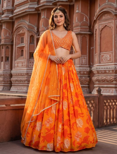 Orange crepe silk lehenga choli with printed festive charm