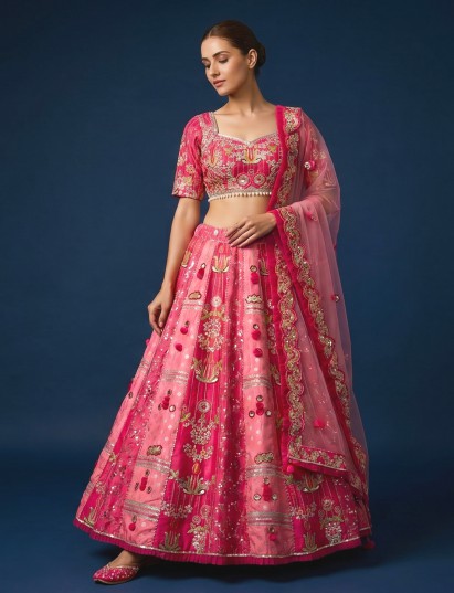 Rani pink silk lehenga choli with mirror tassel detailing