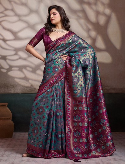 Designer teal blue silk saree with floral zari