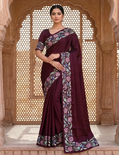 Maroon silk saree highlighted with royal embroidery