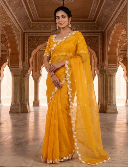 Mustard yellow organza tissue saree with sequins shimmer