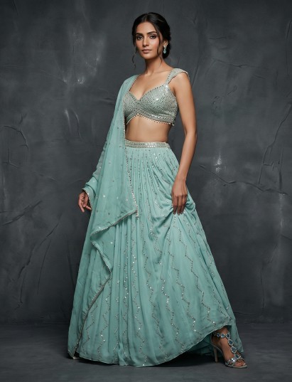 Mint blue lehenga choli enhanced with intricate mirror work