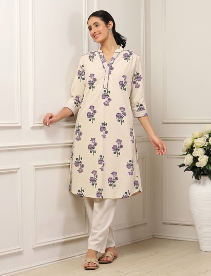Beige floral printed thread work cotton kurti