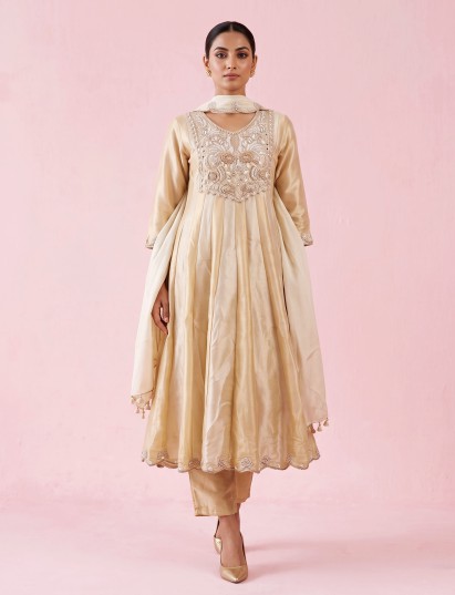 Cream silk anarkali suit with yoke style and dupatta