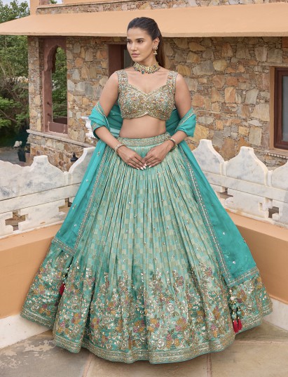 Aqua silk lehenga choli with checks texture and embellished dupatta