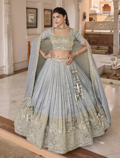 Light grey chiffon silk lehenga choli with peacock motifs