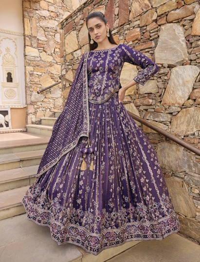 Purple silk lehenga choli with Rajasthani style embellished dupatta