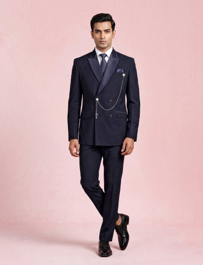 Midnight navy double-breasted tuxedo suit with metallic brooch