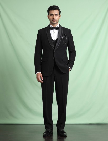 Black three-piece tuxedo suit with crystal bow tie